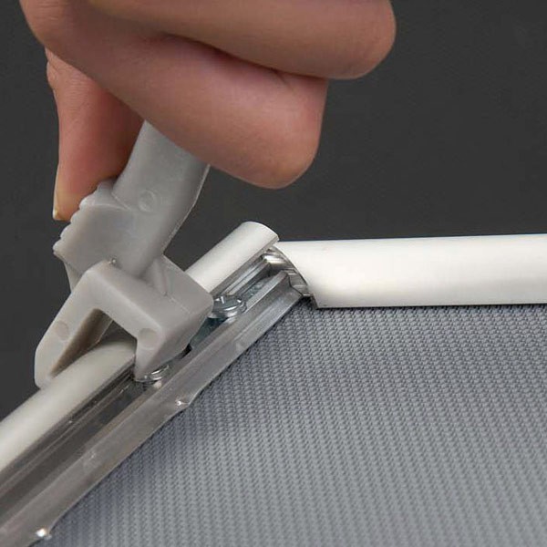 This poster frame requires a special tool to open