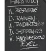 Inscription au marqueur craie liquide blanc sur tableau noir