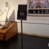 Museum retractable belt stanchion with poster frame