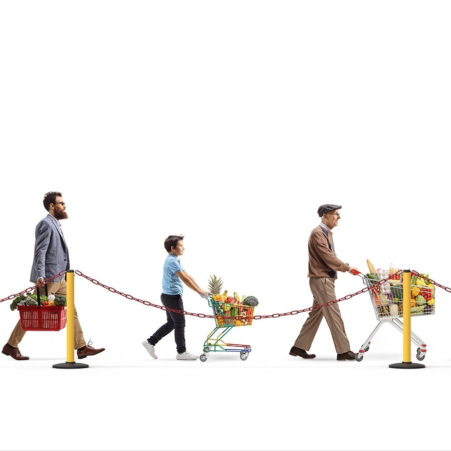Yellow parking chain stanchion in use, queue line delimitation with trolleys