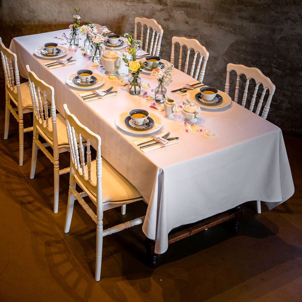 White traditional design chairs in use, situational view