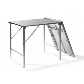Vista lateral mesa plegable para restauración acero inoxidable semiplegada