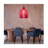 Lampe acoustique Dame Jeanne rouge dans salle à manger