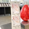 Velo Restyle brochure holder displaying two A4 brochures in a reception area.