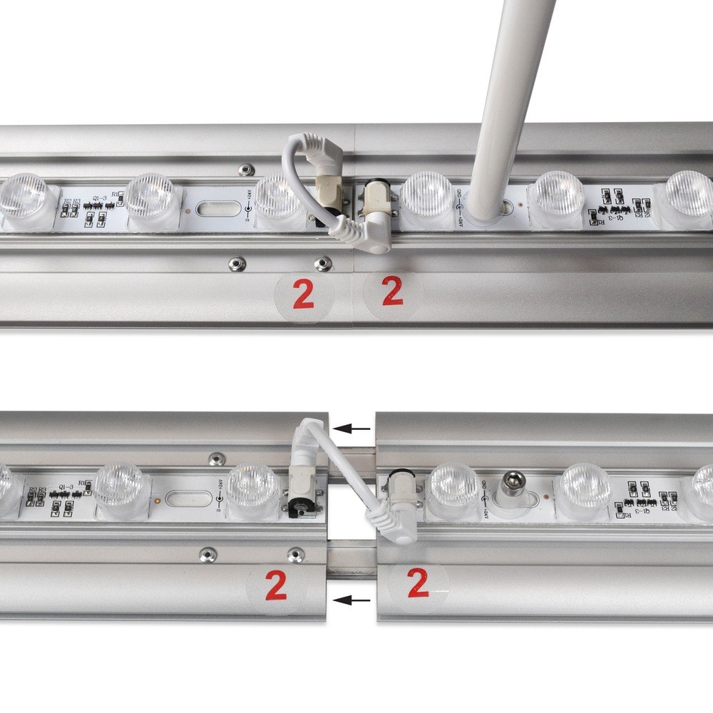 LED bar junction between two frame profiles