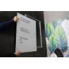 Inserting a printed metal plate onto the Signcode® Slim wall panel with magnetic strips